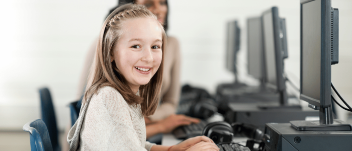 Girl sitting in front of a computer